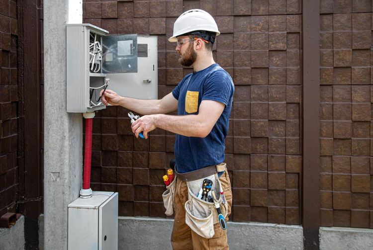 What is the role of an inverter in an electrical installation?